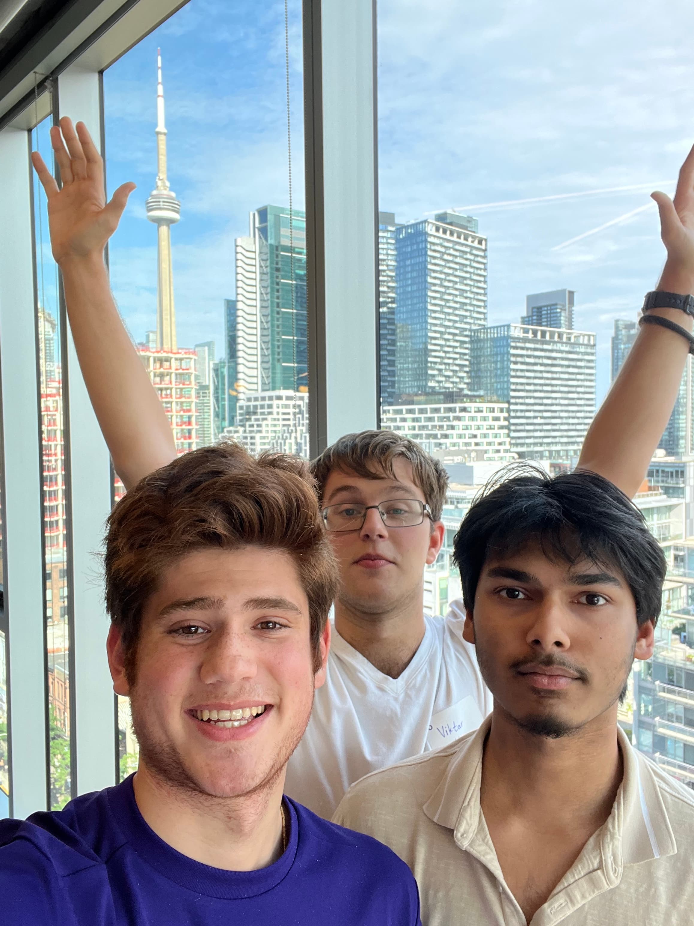 Friends taking a city selfie together