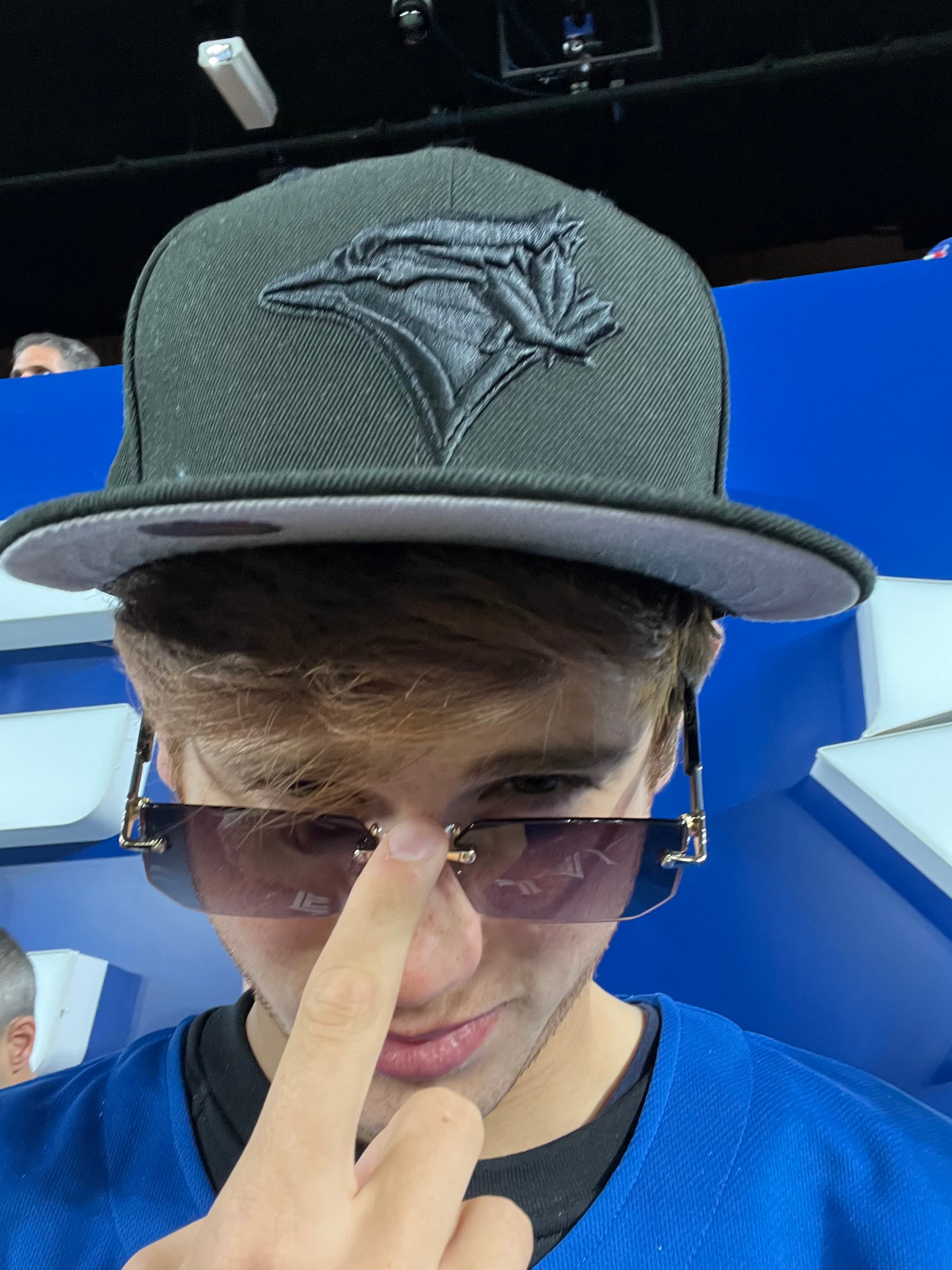 Om wearing a cap outdoors